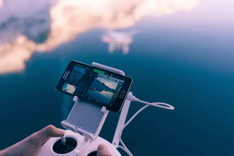 Hands holding a phone with a mobile game open